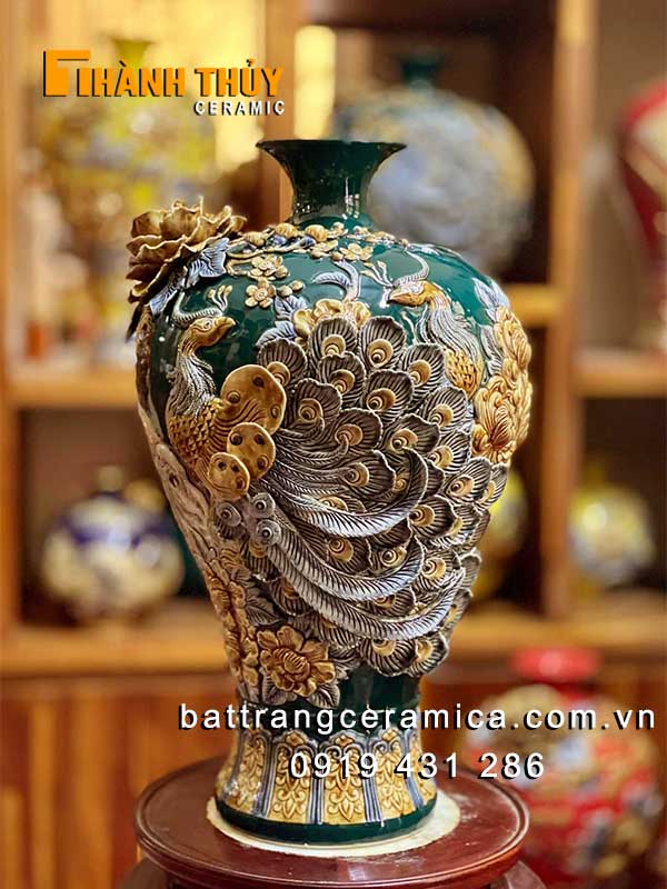 Mai bình tích lộc đắp nổi chim công hoa đào phong thuỷ