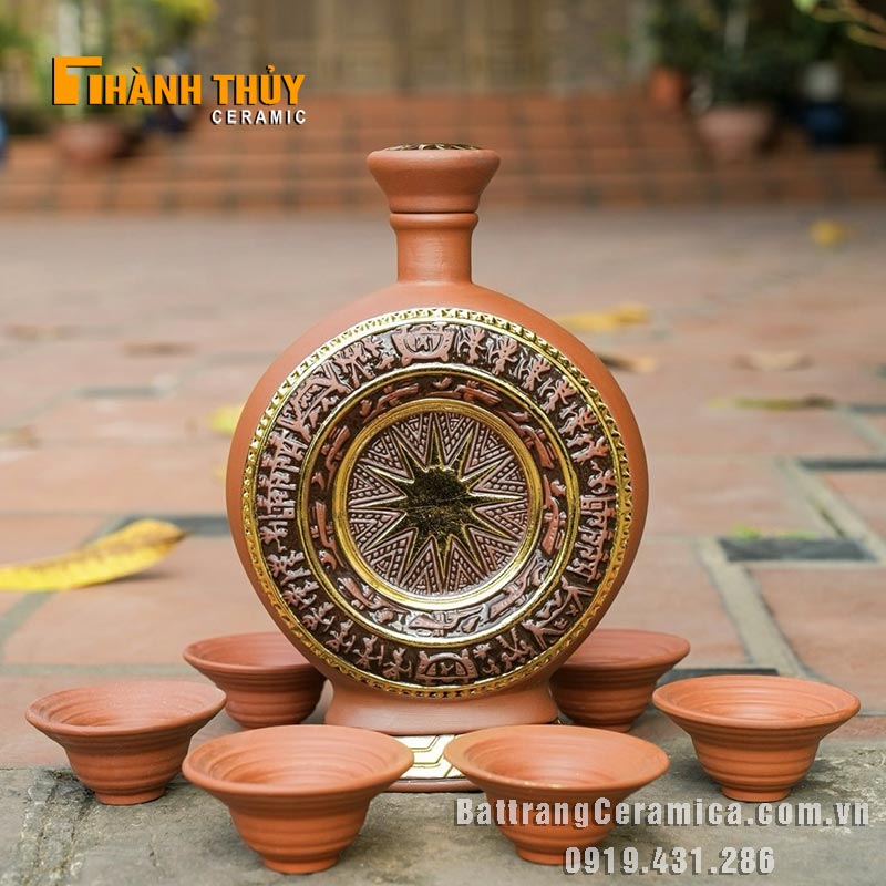 Bộ nậm đựng rượu trống đồng dát vàng 1 lít gốm Bát Tràng