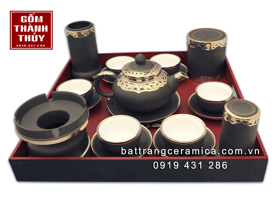 Bộ ấm chén gốm đen bọc đồng bạch sang trọng quà tặng trà ngon Bộ ấm chén gốm đen bọc đồng bạch sang trọng quà tặng trà ngon