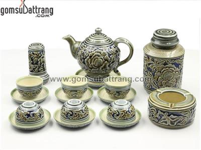 Bộ ấm trà quả hồng men xanh khắc nổi hoa phù dung nguyên bộ đầy đủ phụ kiện mua ngay 